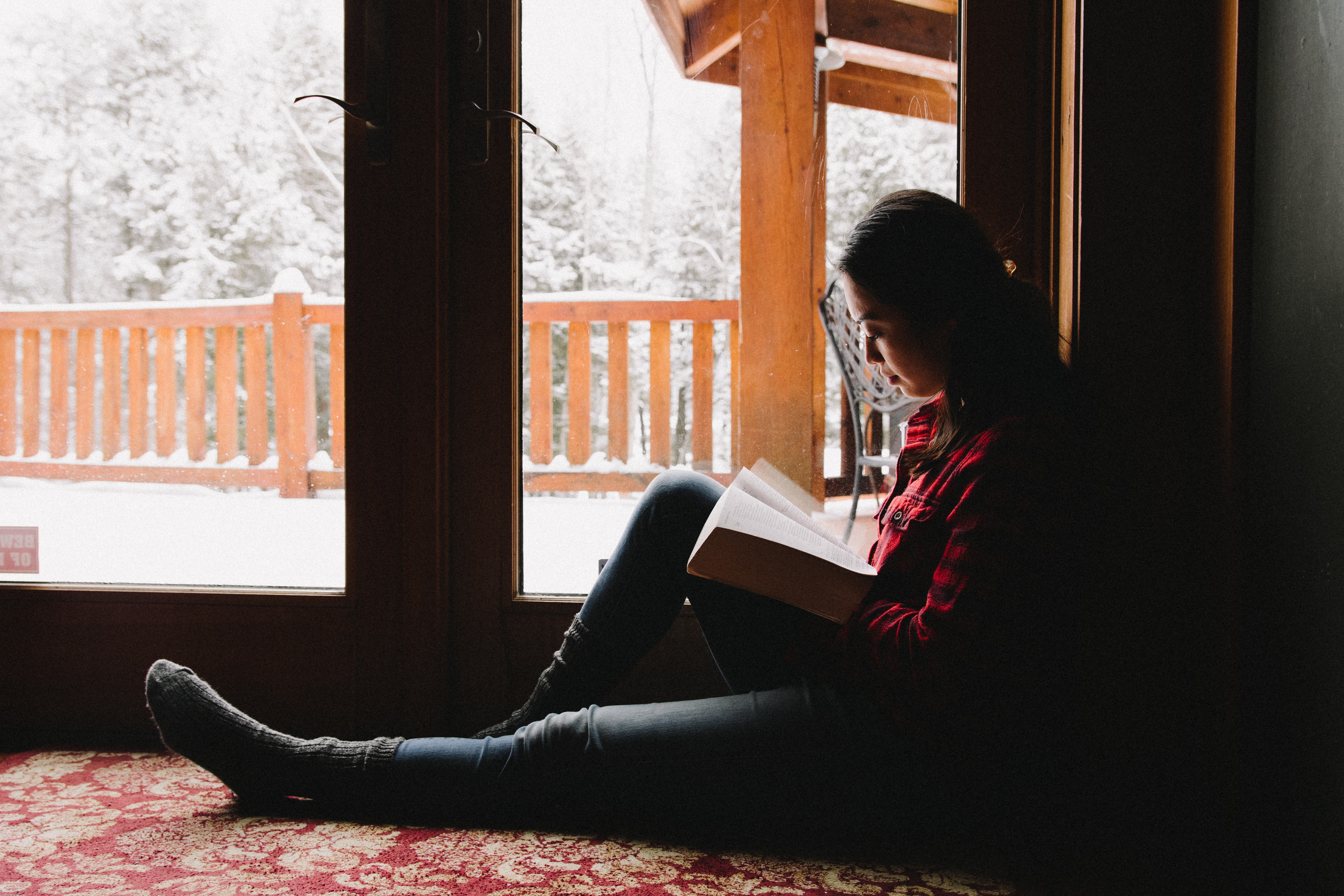 A woman reading a Bible.